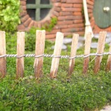 The fence was pushed into the muck wall that I had built earlier and firmed into place.